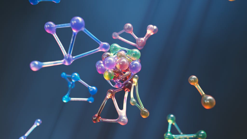 Colorful abstract representation of molecular structures with 3D spheres and connections. Resonant Molecular Signaling