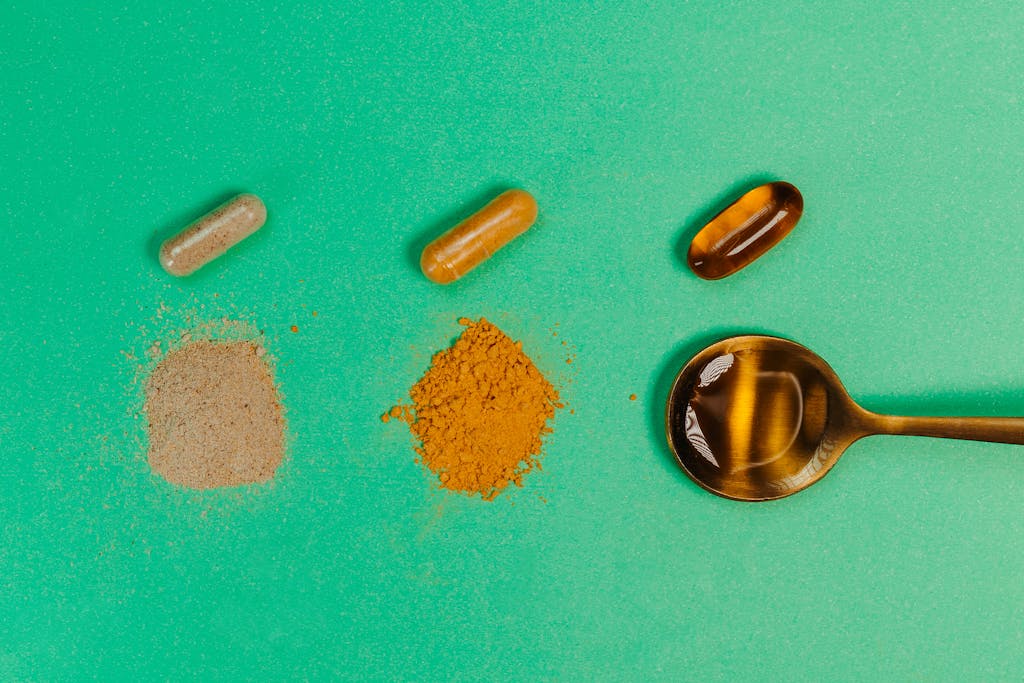 Various nutritional supplements and powders displayed with a spoon on a green background. Hidden Imbalances.